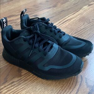 Adidas Black Sneakers with Sporty Mesh Design